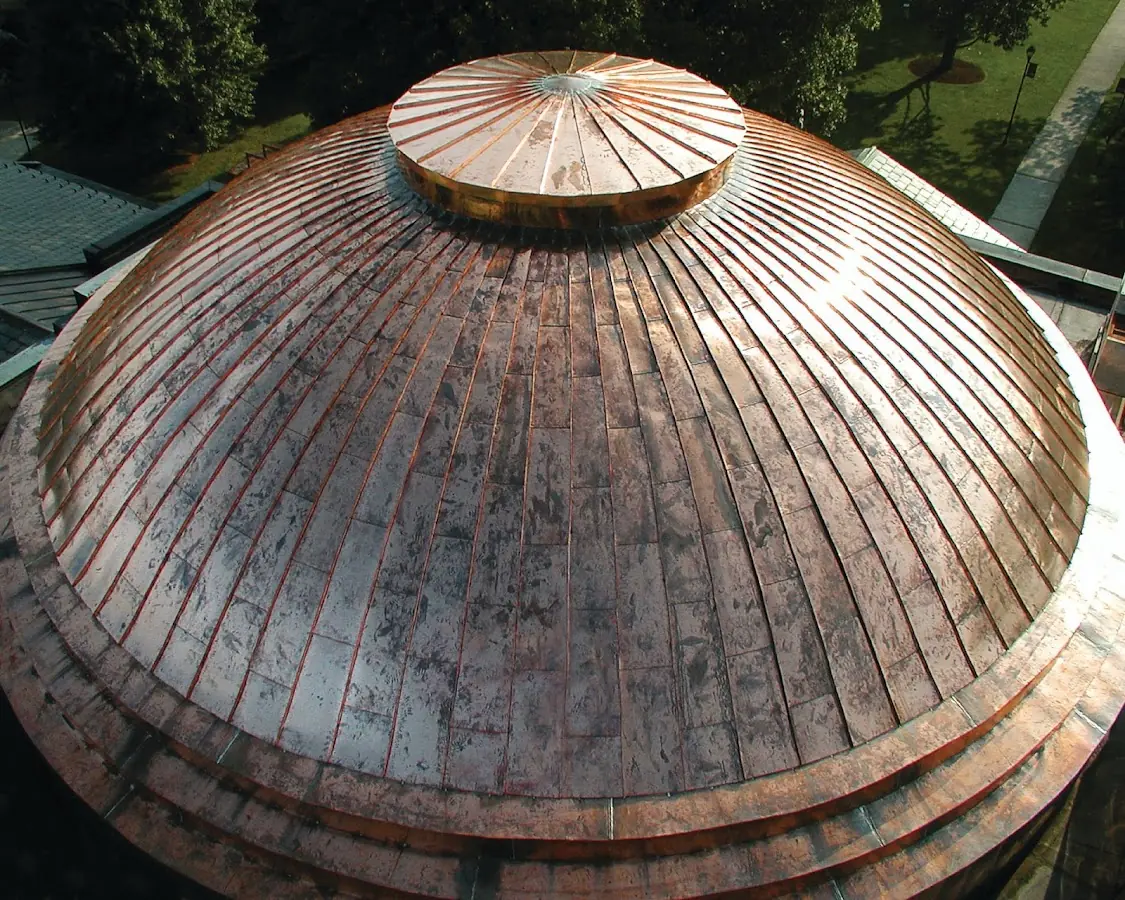 Craftsman Roofing crew installing a new roof in Huntington Station